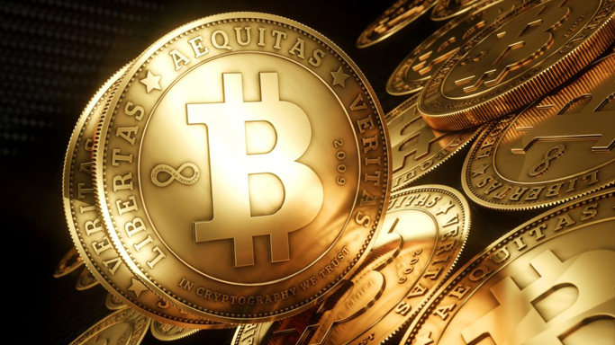Bitcoin rompe récord este domingo al llegar a 9.000 dólares