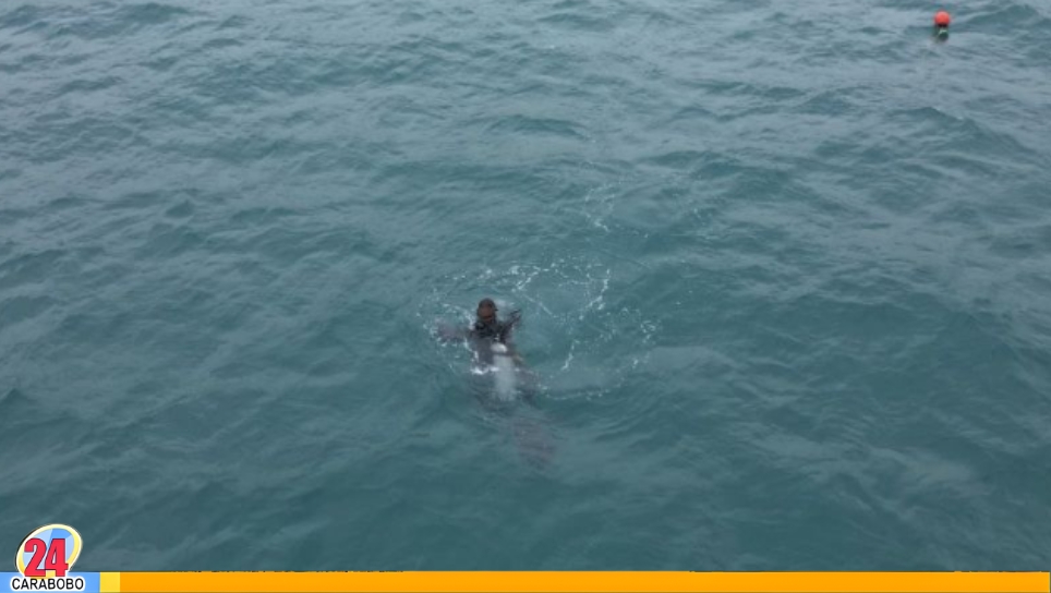 Búsqueda de joven en Playa Huequito