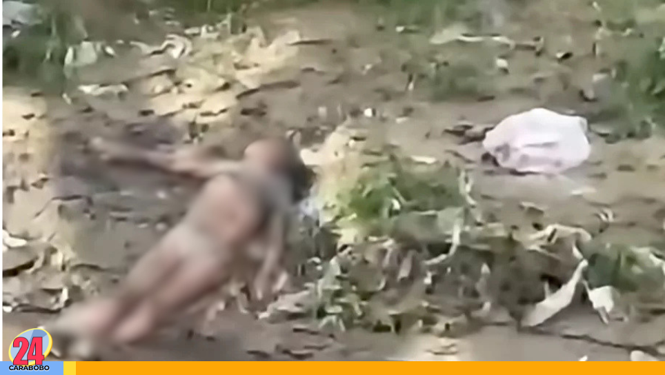 Mujer sin vida río Guaire